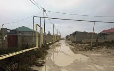 Ramana qəsəbəsində palçıqlı yollar sakinləri çətin vəziyyətdə qoyur